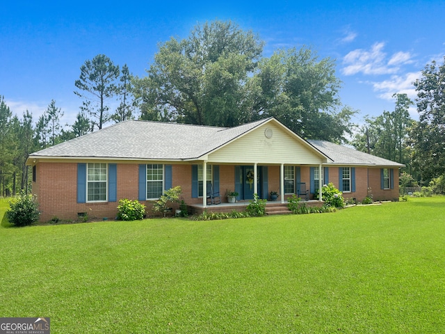 895 Ga Highway 57, Kite, GA 31049 - ranch-style home featuring covered porch, brick siding, a front lawn, and crawl space