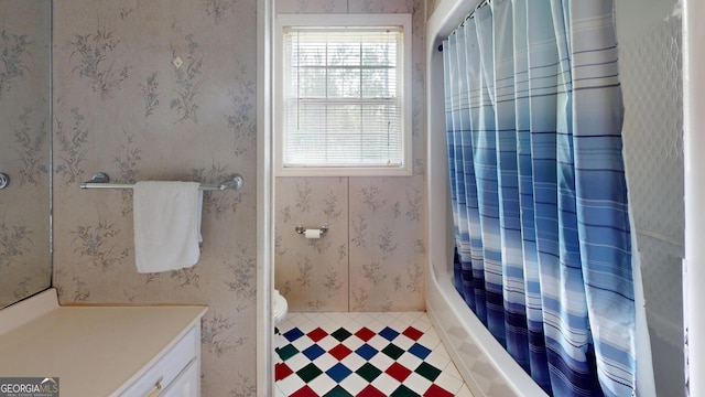 895 Ga Highway 57, Kite, GA 31049 - bathroom with healthy amount of natural light, vanity, and shower / tub combo