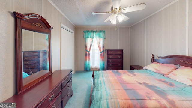 895 Ga Highway 57, Kite, GA 31049 - carpeted bedroom featuring ornamental molding, a textured ceiling, ceiling fan, and a closet