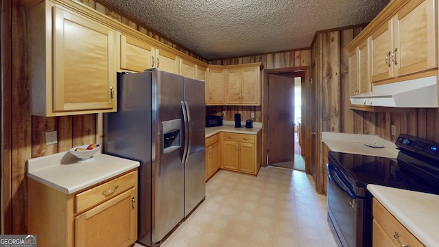 895 Ga Highway 57, Kite, GA 31049 - kitchen featuring electric stove, stainless steel fridge, light floors, wood walls, and light countertops