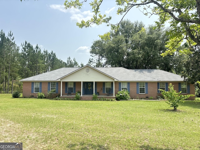 895 Ga Highway 57, Kite, GA 31049 - ranch-style home with a porch, brick siding, crawl space, and a front lawn