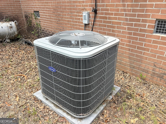 895 Ga Highway 57, Kite, GA 31049 - exterior view of a central air condition unit and brick siding