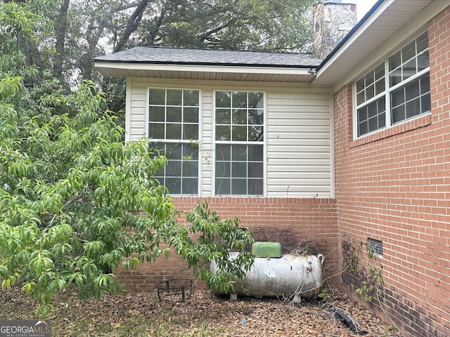 895 Ga Highway 57, Kite, GA 31049 - exterior view of brick siding and a shingled roof