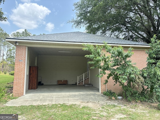 895 Ga Highway 57, Kite, GA 31049 - view of vehicle parking with a carport and entry steps