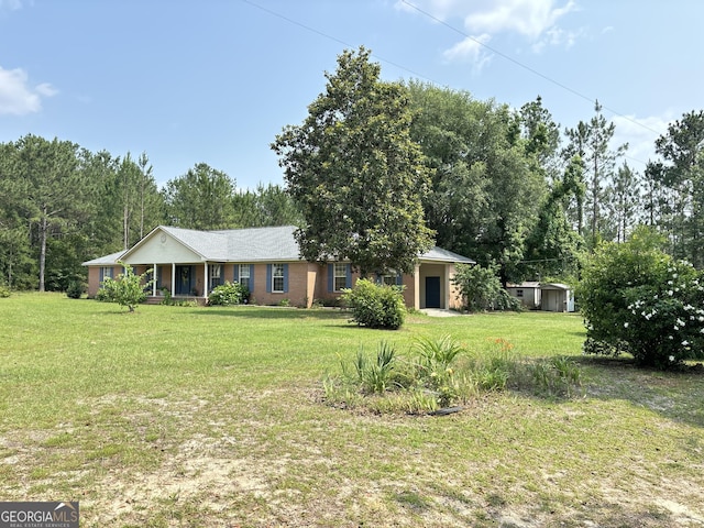 895 Ga Highway 57, Kite, GA 31049 - view of front of property featuring a front lawn and a porch