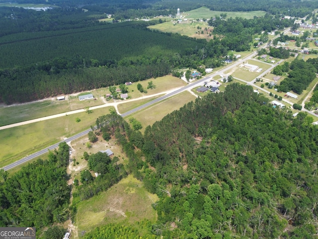 895 Ga Highway 57, Kite, GA 31049 - aerial overview of property's location featuring a heavily wooded area