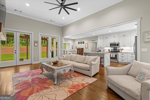 177 Garnett Point Dr, Carrollton, GA 30117 - living area with french doors, ceiling fan, plenty of natural light, recessed lighting, and wood finished floors