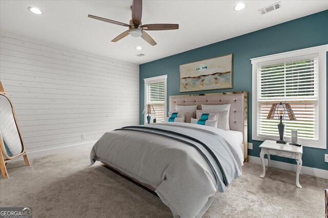 177 Garnett Point Dr, Carrollton, GA 30117 - bedroom featuring recessed lighting, light carpet, wood walls, and a ceiling fan