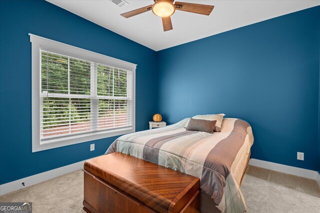 177 Garnett Point Dr, Carrollton, GA 30117 - carpeted bedroom with baseboards and ceiling fan