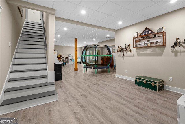 177 Garnett Point Dr, Carrollton, GA 30117 - exercise room with wood finished floors, recessed lighting, and a paneled ceiling