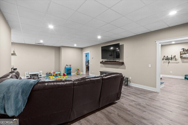 177 Garnett Point Dr, Carrollton, GA 30117 - living room with wood finished floors, a paneled ceiling, and recessed lighting