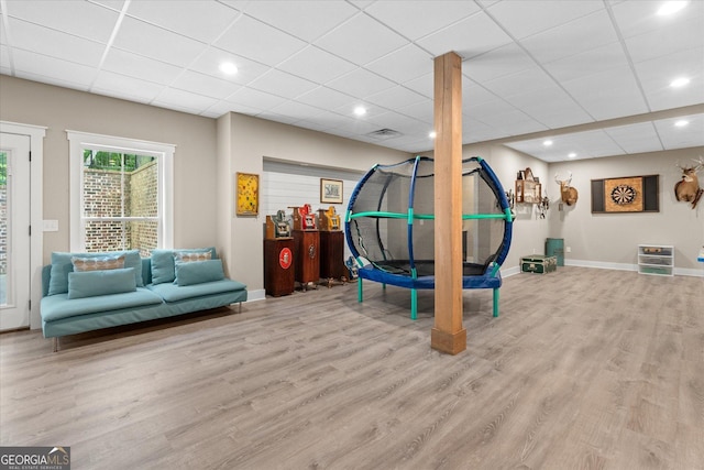 177 Garnett Point Dr, Carrollton, GA 30117 - playroom featuring wood finished floors, a paneled ceiling, and recessed lighting