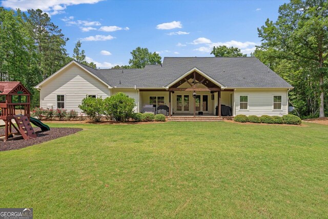 177 Garnett Point Dr, Carrollton, GA 30117 - rear view of property featuring a playground, a lawn, french doors, and a porch