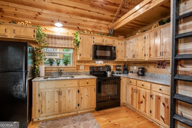 151 Rushmore Ln, Murphy, NC 28906 - kitchen featuring black appliances, light brown cabinetry, light wood finished floors, wooden ceiling, and light stone countertops