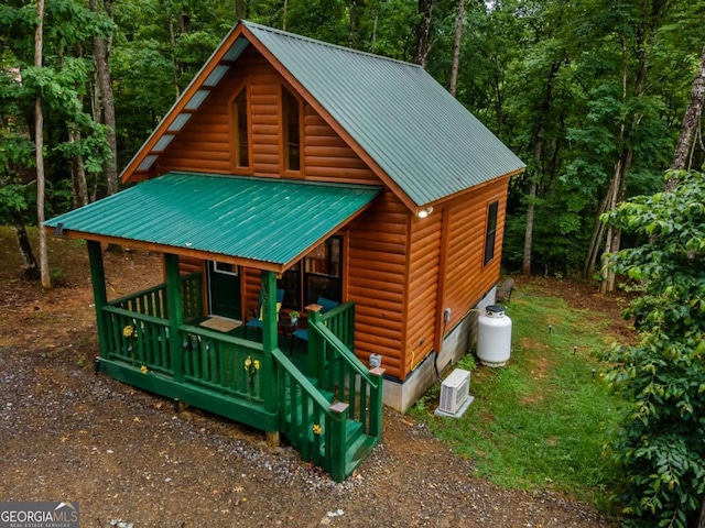151 Rushmore Ln, Murphy, NC 28906 - chalet / cabin featuring faux log siding, a metal roof, and a forest view