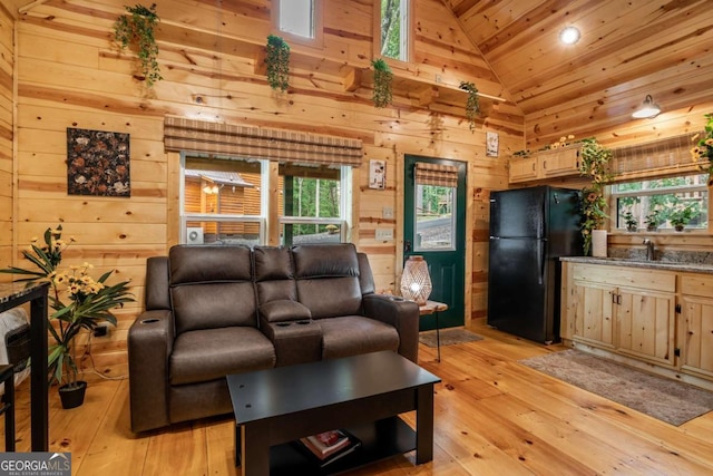 151 Rushmore Ln, Murphy, NC 28906 - living room featuring lofted ceiling, light wood finished floors, wooden ceiling, wood walls, and recessed lighting
