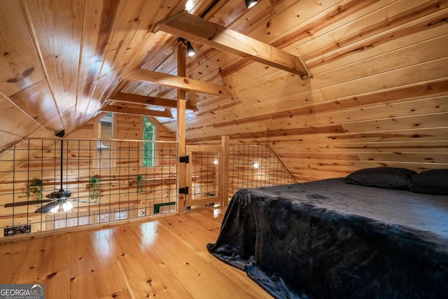 151 Rushmore Ln, Murphy, NC 28906 - bedroom with wooden walls, wood-type flooring, wood ceiling, and lofted ceiling