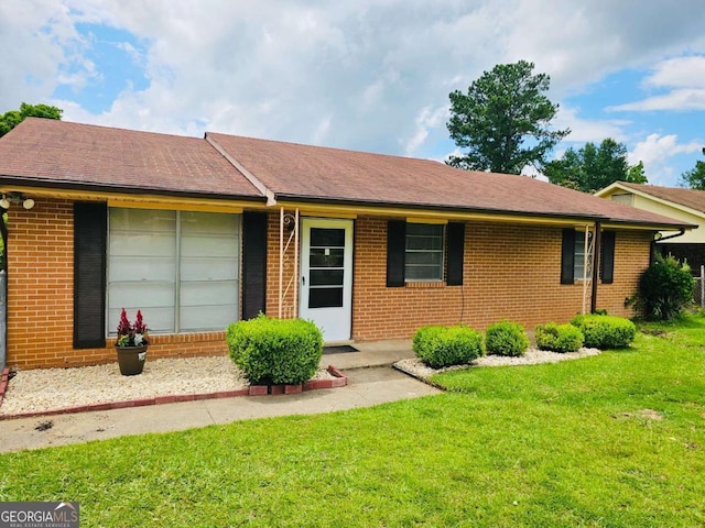 3027 Lansing Ave, Columbus, GA 31907 - single story home with brick siding and a front lawn