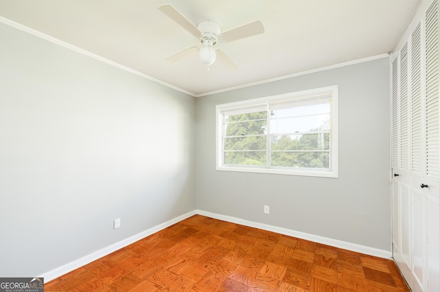 3027 Lansing Ave, Columbus, GA 31907 - unfurnished bedroom featuring a closet, crown molding, and ceiling fan