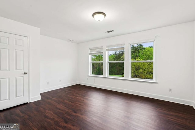 2539 Larson Creek Cv, Duluth, GA 30097 - empty room with wood finished floors and baseboards