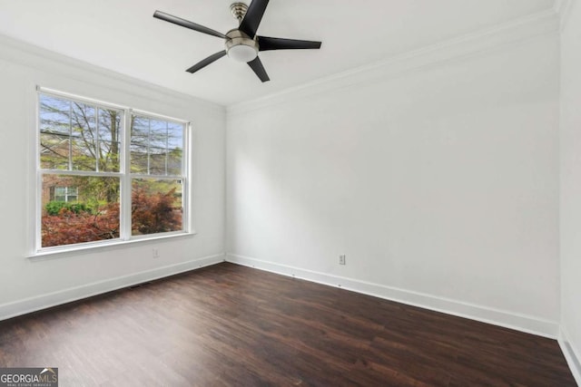 2539 Larson Creek Cv, Duluth, GA 30097 - spare room featuring crown molding, dark wood-style flooring, and ceiling fan