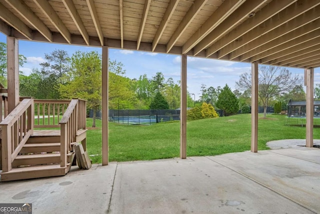 2539 Larson Creek Cv, Duluth, GA 30097 - view of patio / terrace with a trampoline and a pool