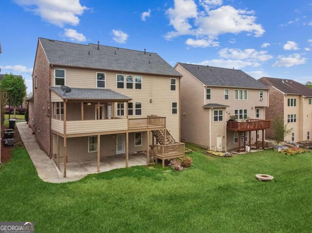 2539 Larson Creek Cv, Duluth, GA 30097 - back of property with a patio, a deck, stairway, a lawn, and a shingled roof