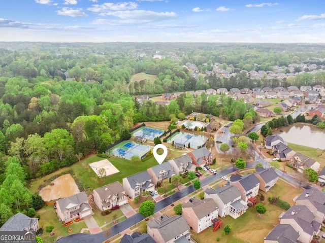 2539 Larson Creek Cv, Duluth, GA 30097 - aerial view of property's location with nearby suburban area and a forest
