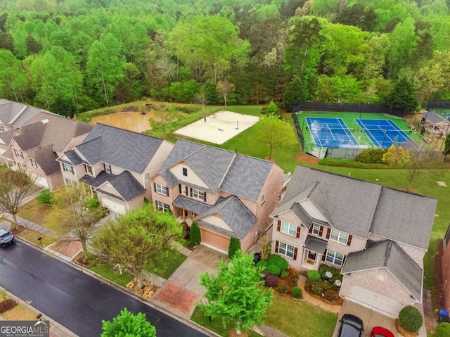 2539 Larson Creek Cv, Duluth, GA 30097 - aerial view of residential area with a forest