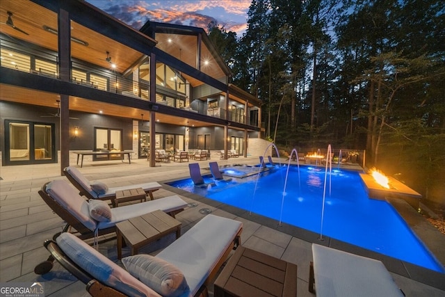 4451 Shellie Ln, Oakwood, GA 30566 - swimming pool featuring a jacuzzi, a patio area, and a fire pit