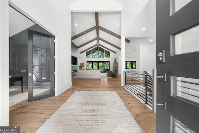 4451 Shellie Ln, Oakwood, GA 30566 - entryway featuring wood finished floors, high vaulted ceiling, beam ceiling, and recessed lighting