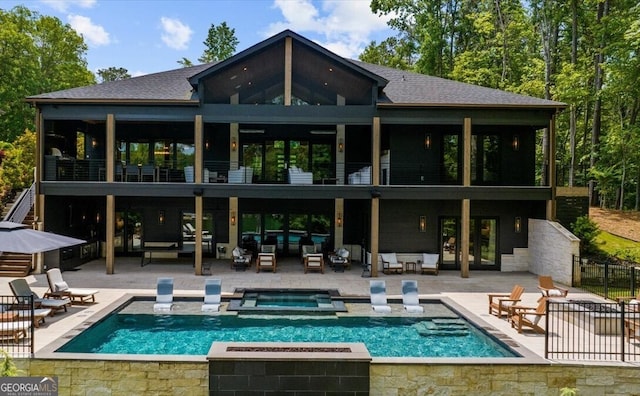 4451 Shellie Ln, Oakwood, GA 30566 - rear view of property with an outdoor living space, a patio area, roof with shingles, and a pool with connected hot tub