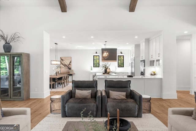 4451 Shellie Ln, Oakwood, GA 30566 - living room featuring beam ceiling, recessed lighting, and light wood finished floors