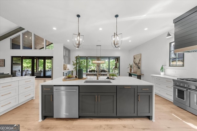 4451 Shellie Ln, Oakwood, GA 30566 - kitchen featuring stainless steel appliances, a chandelier, light countertops, plenty of natural light, and recessed lighting