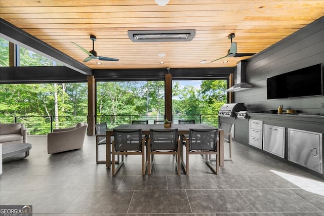 4451 Shellie Ln, Oakwood, GA 30566 - view of patio / terrace featuring exterior kitchen, ceiling fan, and outdoor dining space