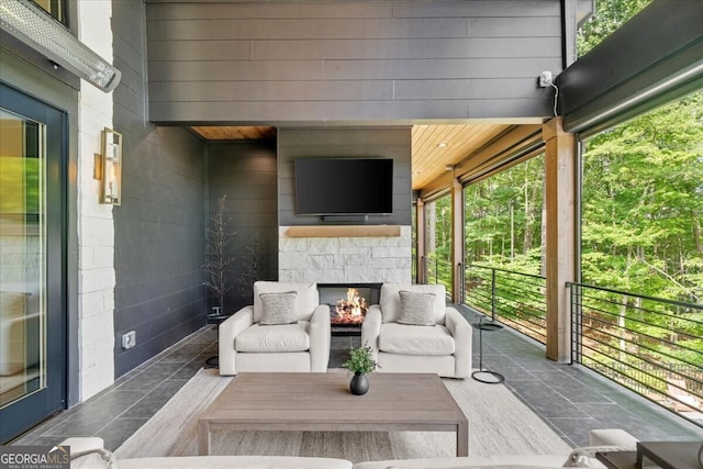 4451 Shellie Ln, Oakwood, GA 30566 - deck with an outdoor living space with a fireplace