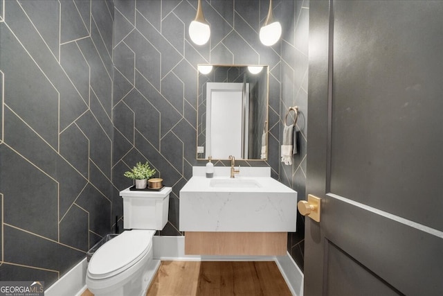 4451 Shellie Ln, Oakwood, GA 30566 - bathroom with vanity, tile walls, and wood finished floors