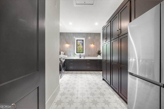 4451 Shellie Ln, Oakwood, GA 30566 - corridor featuring light flooring, washer / dryer, and recessed lighting