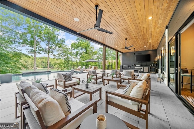 4451 Shellie Ln, Oakwood, GA 30566 - view of patio featuring outdoor lounge area, ceiling fan, and exterior kitchen