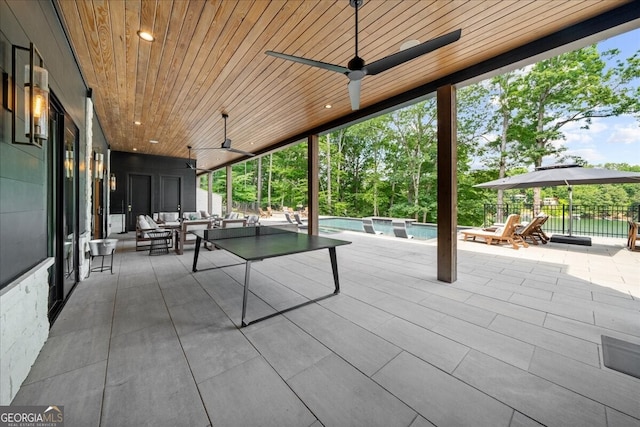 4451 Shellie Ln, Oakwood, GA 30566 - view of patio / terrace featuring a ceiling fan, outdoor lounge area, and an outdoor pool