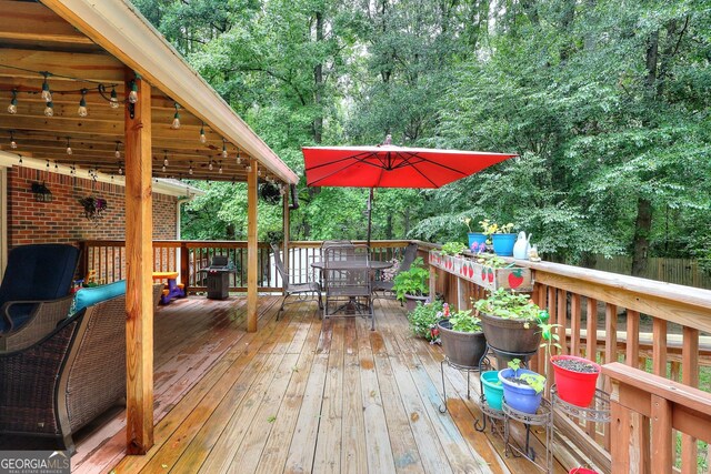 241 Lavern Ct, Winder, GA 30680 - deck with outdoor dining area