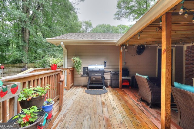 241 Lavern Ct, Winder, GA 30680 - wooden deck featuring a grill