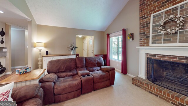 241 Lavern Ct, Winder, GA 30680 - living room featuring carpet, lofted ceiling, and a brick fireplace