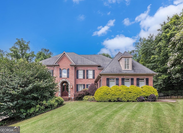 1155 Admiral Xing, Alpharetta, GA 30005 - georgian-style home with brick siding and a front yard