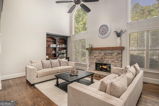 1155 Admiral Xing, Alpharetta, GA 30005 - living area featuring a towering ceiling, ceiling fan, wood finished floors, and plenty of natural light