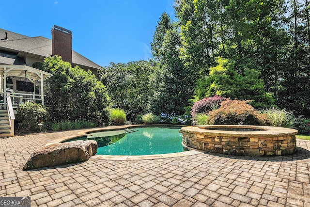1155 Admiral Xing, Alpharetta, GA 30005 - view of pool with a patio area and a pool with connected hot tub