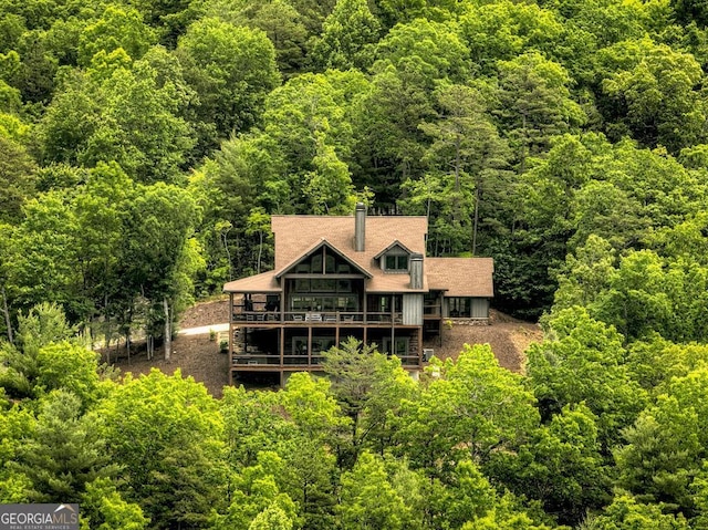 330 Serenity Ridge Ln, Mineral Bluff, GA 30559 - back of property with a wooded view and a wooden deck