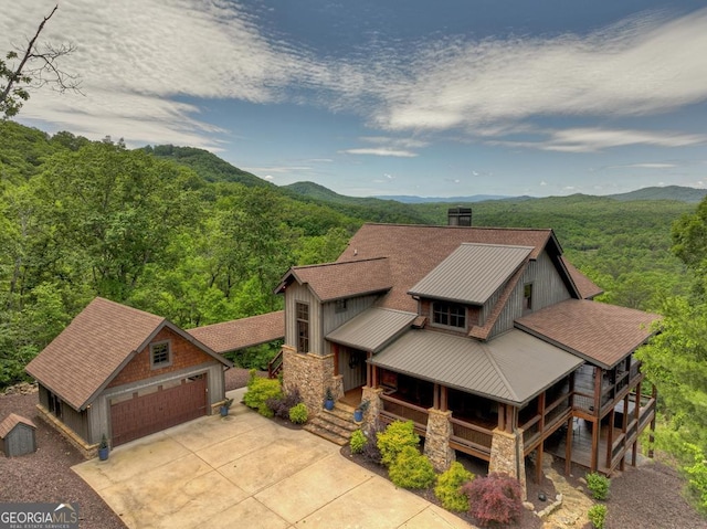 330 Serenity Ridge Ln, Mineral Bluff, GA 30559 - view of front of property with an outdoor structure, stone siding, driveway, a forest view, and a mountain view