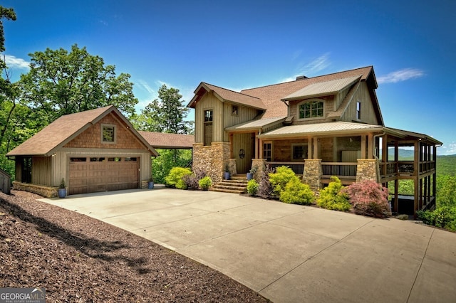 330 Serenity Ridge Ln, Mineral Bluff, GA 30559 - view of front of house with stone siding, board and batten siding, a porch, an outdoor structure, and a metal roof