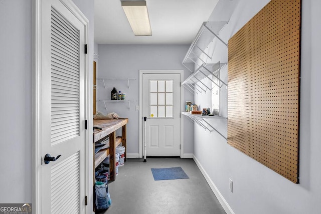 269 Legends Trce, Mcdonough, GA 30253 - entryway featuring concrete flooring and baseboards